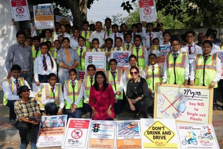 Road safety drive-by school students
