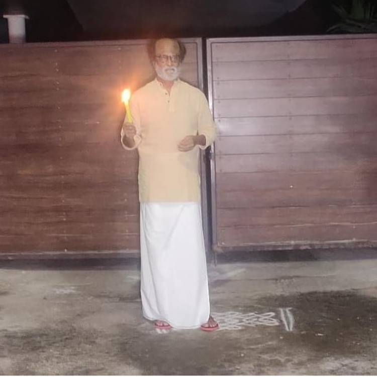 Superstar Rajinikanth poses with a candle as part of the #LightForIndia initiative by our Hon'ble PM of India