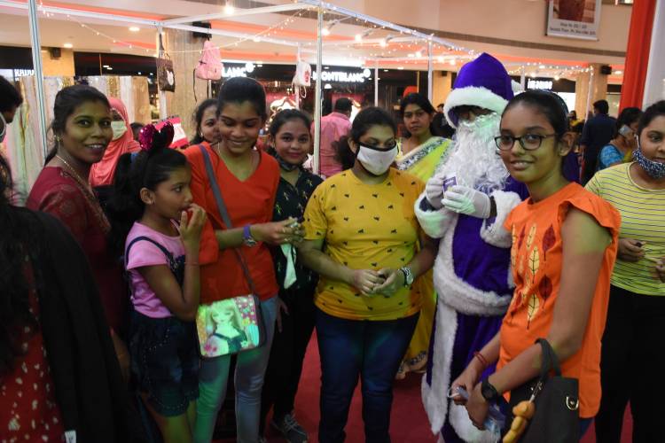 Naturals Salon launch their very own Safety Kits with Purple Santa Claus at Express Avenue