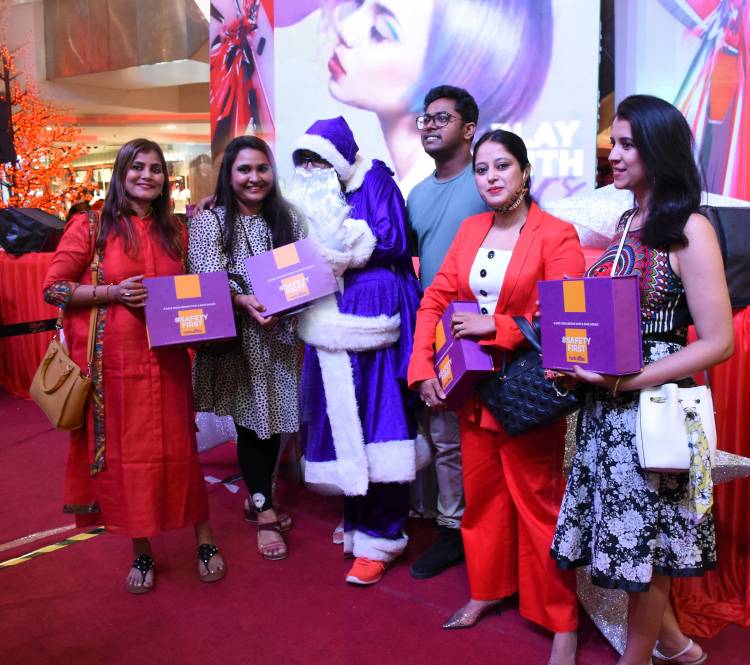 Naturals Salon launch their very own Safety Kits with Purple Santa Claus at Express Avenue