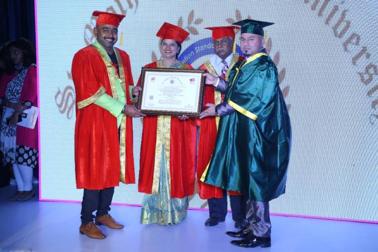 Mr.Sathish Kumar from Ooty received the Gems of Universe & Honourary Doctorate, by St. Mother Therasa University